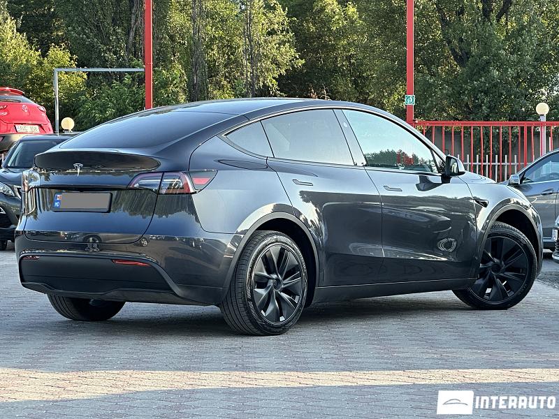 Tesla Model Y 3 tesla model y 2024